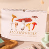 2024 A4 Landscape Mushroom Calendar. 100% FSC Certified Recycled Paper. Each month features an (edible) mushrooms and has a short descritpion and the fruiting season of the mushroom.