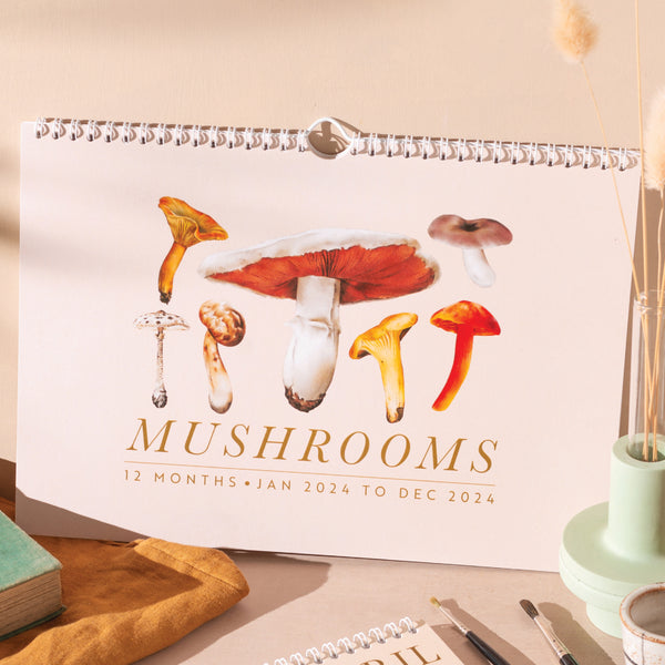 2024 A4 Landscape Mushroom Calendar. 100% FSC Certified Recycled Paper. Each month features an (edible) mushrooms and has a short descritpion and the fruiting season of the mushroom.
