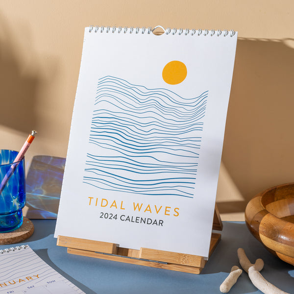 2024 A4 Calendar - line-art illustrations inspired by the ocean and rolling waves. 100% Recycled Paper, Made in the UK. Includes week numbers and moon phases.