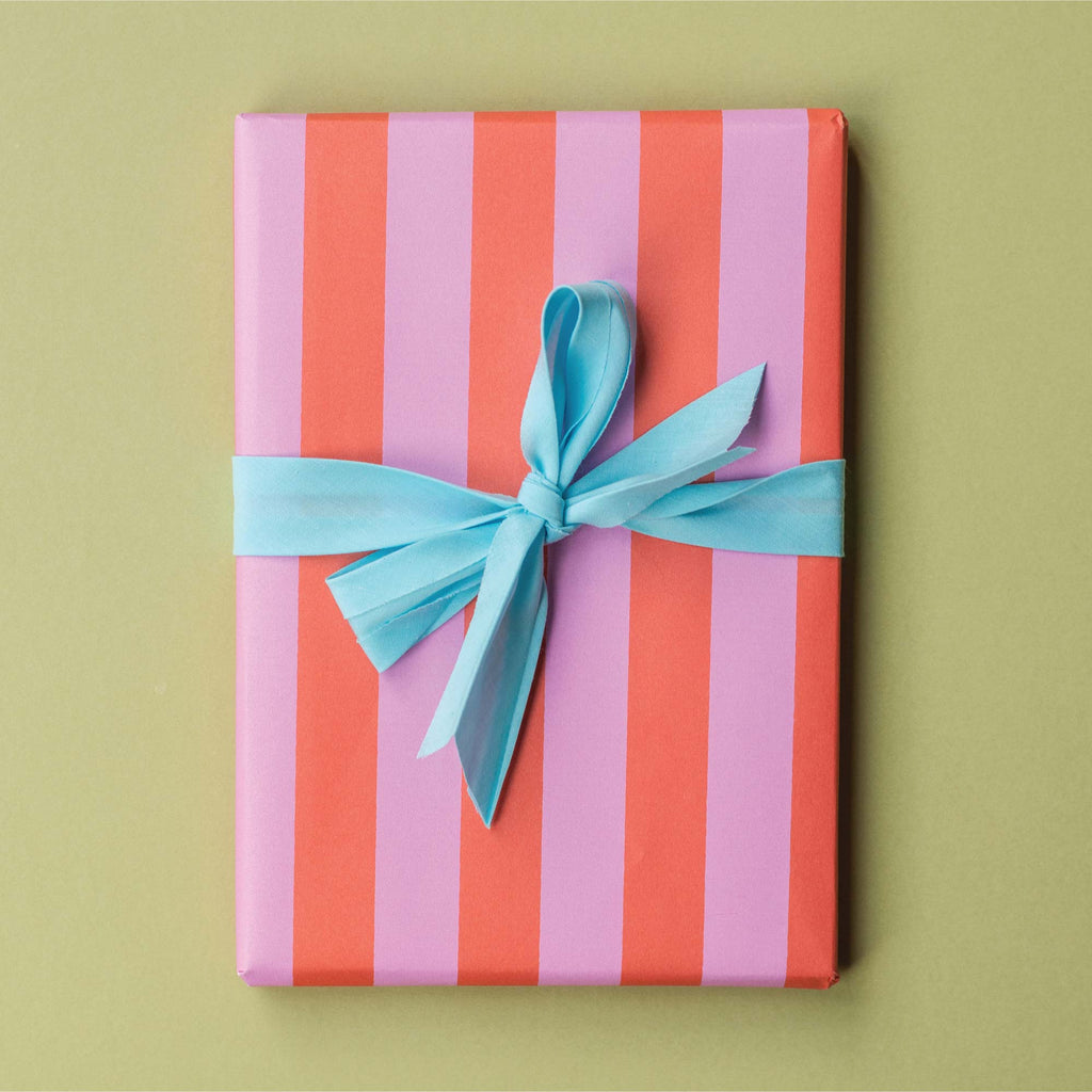 hot pink stripe gift wrap. 5 pack. 10 pack. christmas wrapping paper. birthday wrapping paper. eco gift wrap. 100% recycled paper. made in the UK. gift paper. recycled wrapping. gift wrap.