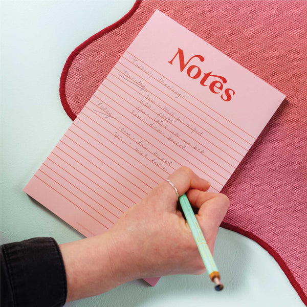a5 recycled paper notepad in pink and red