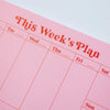 a4 vertical weekly planner in pink and red. 100% recycled paper. made in the UK.