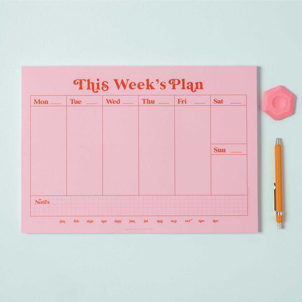 a4 vertical weekly planner in pink and red. 100% recycled paper. made in the UK.