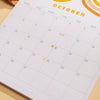 2024, A4 hanging wall calendar abstract, rainbow inspired designs. 100% recycled paper. Made in the UK.