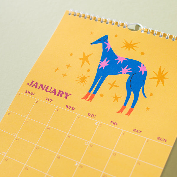 2024 A4 Calendar - dogs and doodles on each monthly page. 100% Recycled Paper, Made in the UK. Includes week number and moon phases.