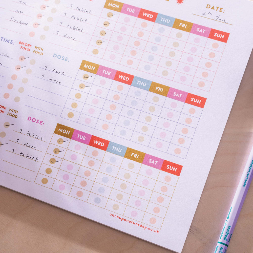 a4 colourful medication schedule and vitamin log. 100% recycled paper. 52 page planner pad.