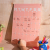 A3 portrait wipeable acrylic weekly planner in peach. 100% Greencast Recycled Acrylic. Design and printed in the UK.