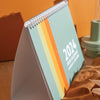2024 desk calendar, A5 size. Minimalist surf inspired colour palette. 100% Recycled Paper and made in the UK.