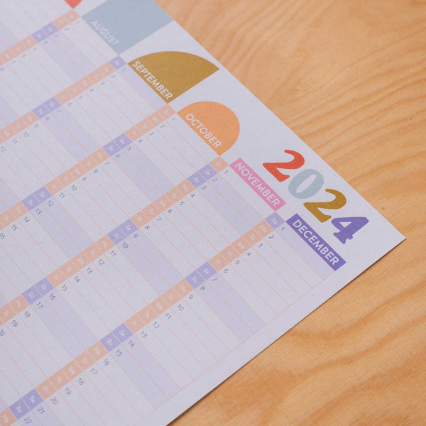 2024 compact and colourful wall planner. 100% recycled paper and made in the UK.