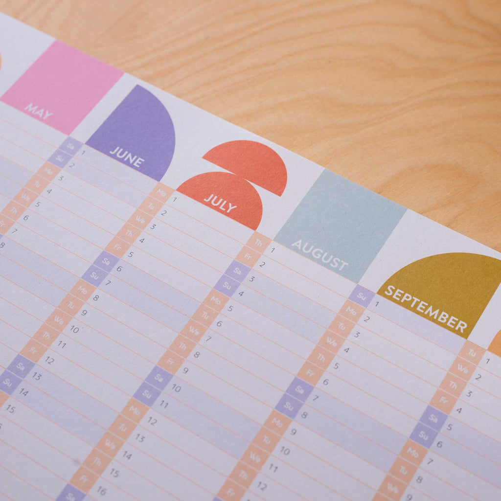 2024 compact and colourful wall planner. 100% recycled paper and made in the UK.