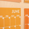 Undated A3 Wall Calendar - 12 seperate monthly pages in a surf inspired colour palette. 100% Recycled Paper, Made in the UK.