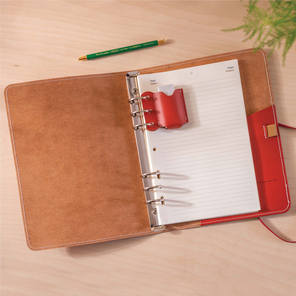 A5 filofax style refillable binder made from recycled leather. handmade in the UK.