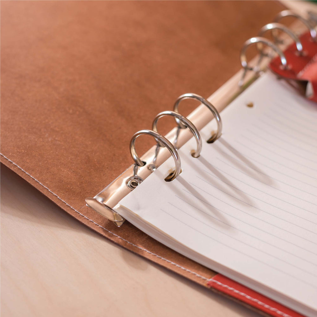 A5 filofax style refillable binder made from recycled leather. handmade in the UK.