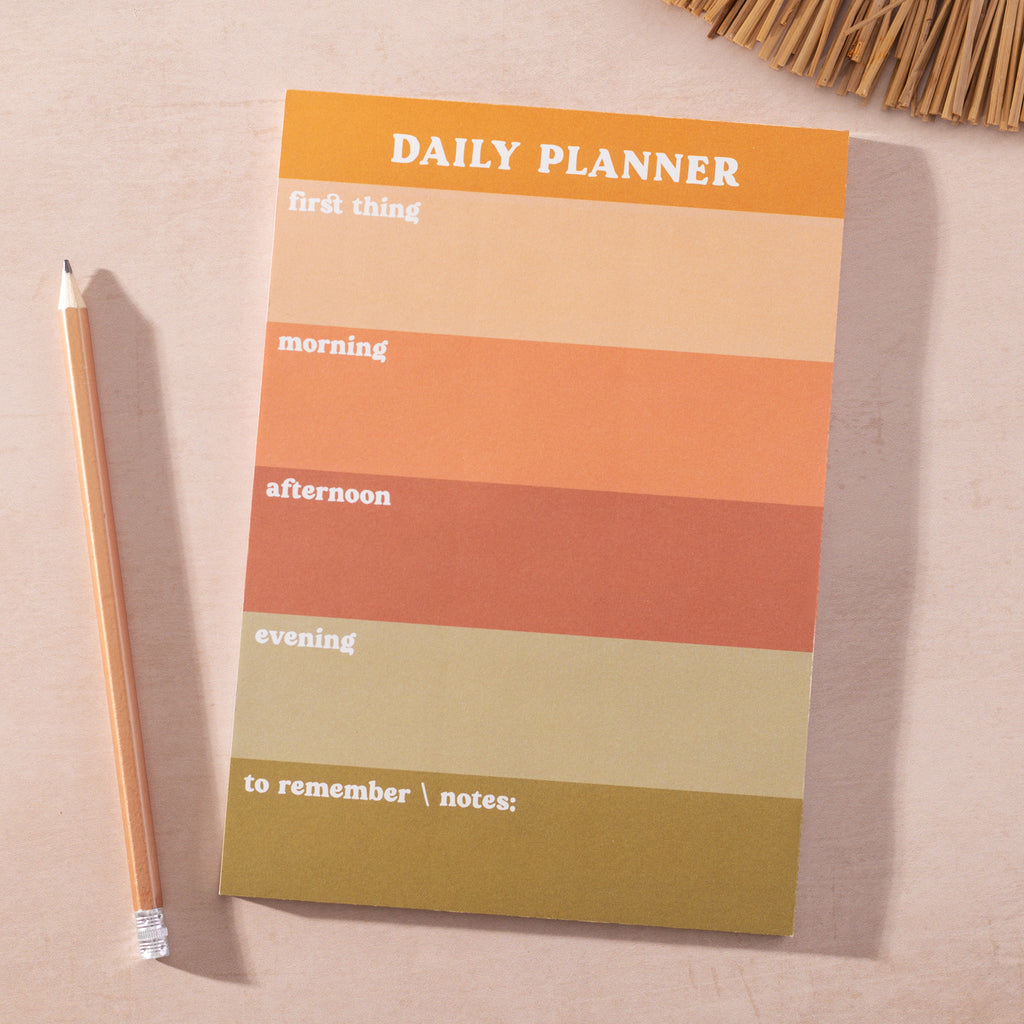 A5 Daily Planner Pad in Muted Colour Block. This time blocking style desk pad helps organise your day with ease. 100% Recycled Paper. Made in the UK. ADHD daily planner.