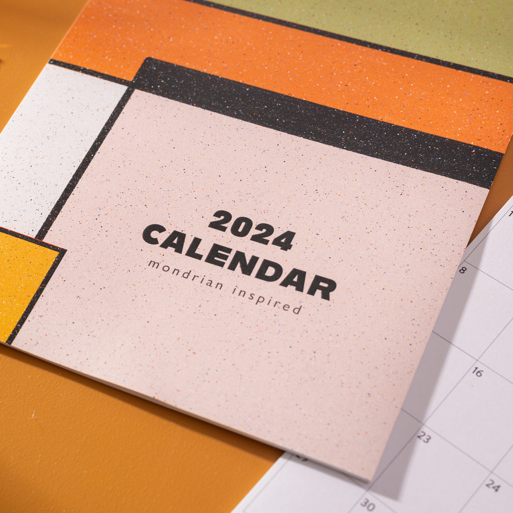 2024, A4 hanging wall calendar, the design is inspired by mondrian. 100% recycled paper. Made in the UK.