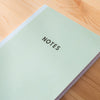 mint lined notebook. 60 pages. 100% recycled paper.